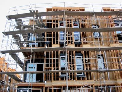 a building under construction surrounded by scaffolding